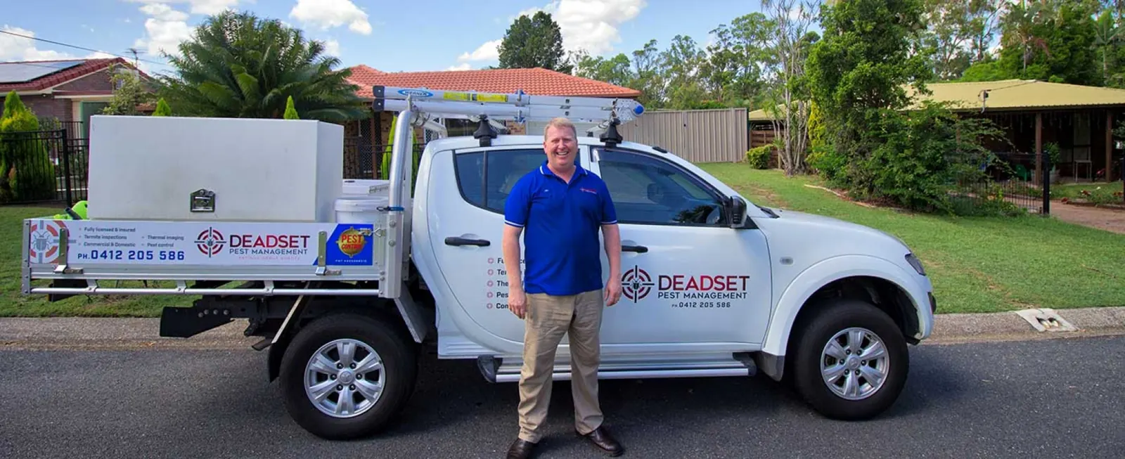 Jon's work ute loaded with pest control equipment and a Termatrac iTracker case